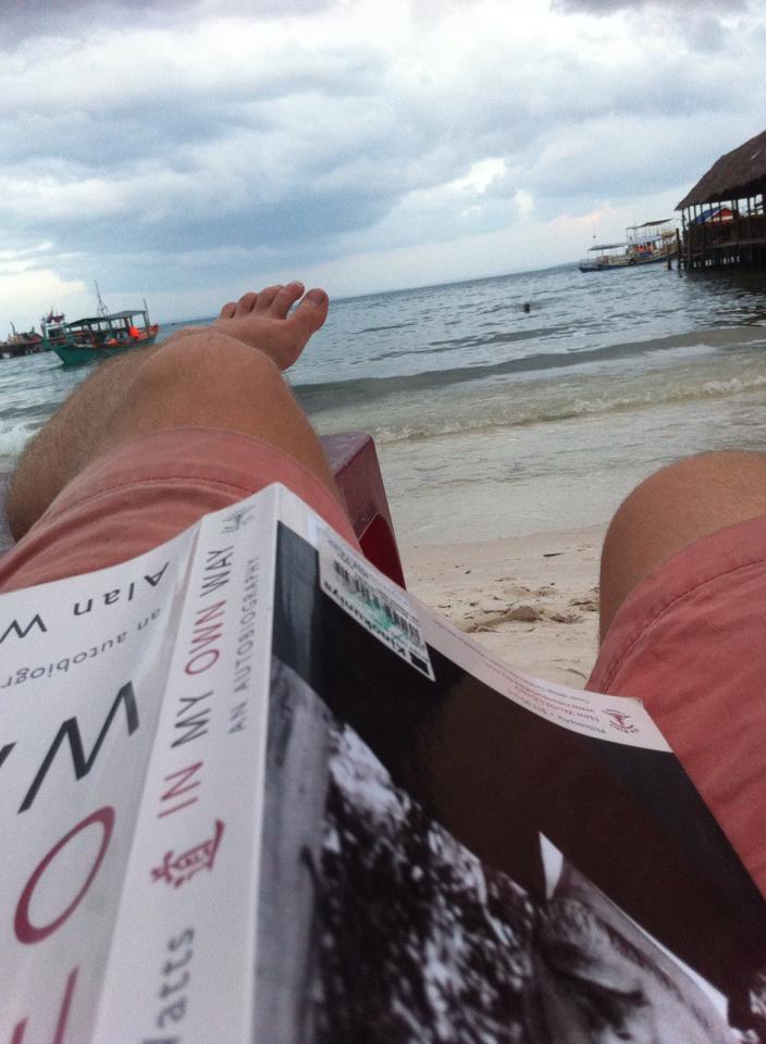 Relaxing with Alan Watts on a beach in Cambodia.