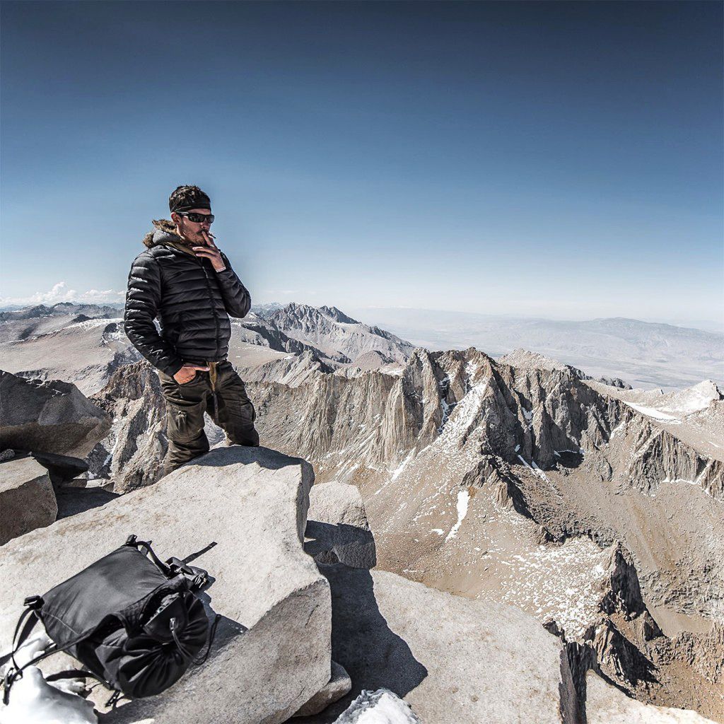 justin alexander smoking on mountain