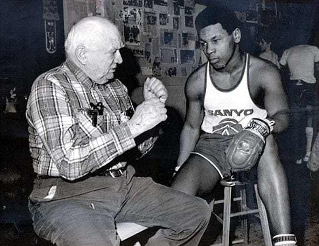 Young Mike Tyson with coach Cus D'Amato